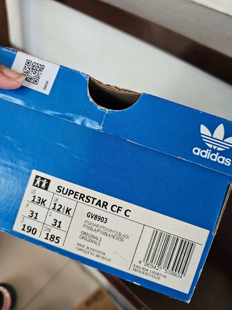 Adidas Superstar Velcro Shoes (Category: Babies & Kids Fashion) located in Imus. Submitted by lanaxalan (Listing ID 1427800261, Image 3). Description: Adidas Superstar CF C velcro shoes. White with three stripes and velcro straps. Includes the original box. Size is US 13K, UK 12K, FR 31, JP 190. The box has some wear and tear. Bought in Adidas Hong Kong. .
