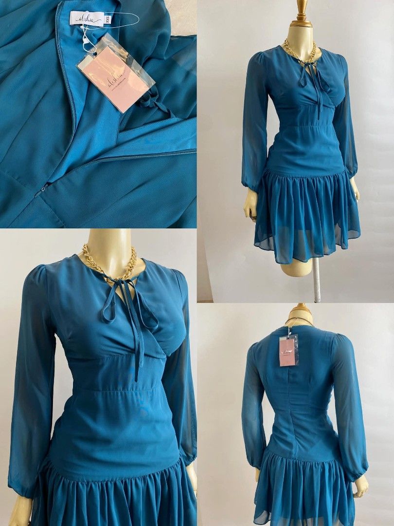 Aleisha Dress - Teal (Category: Dresses) located in Manila. Submitted by eli959 (Listing ID 1427850051, Image 1). Description: A L E I S H A chiffon dark teal longsleeves dress. Premium Quality.Super nice in actual. Backzip. Fits up to XS-S Bust: 34" Waist: 25" Length: 34".