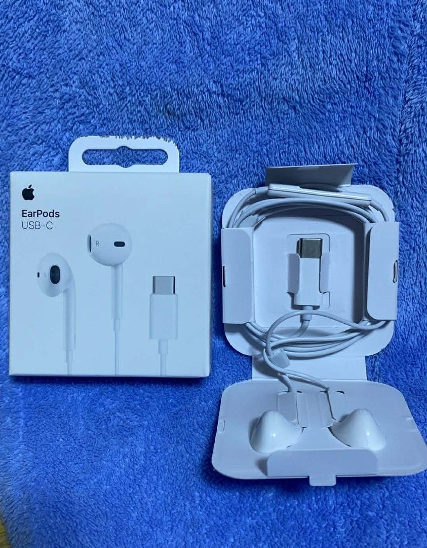 Apple EarPods USB-C (Category: Earphones) located in Manila. Submitted by pricious (Listing ID 1427887759, Image 1). Description: Genuine Apple EarPods with USB-C connector. Comes with the original box and packaging. The earphones are white. The box shows the Apple logo and the EarPods name. The USB-C connector is visible in the image. The packaging is intact..