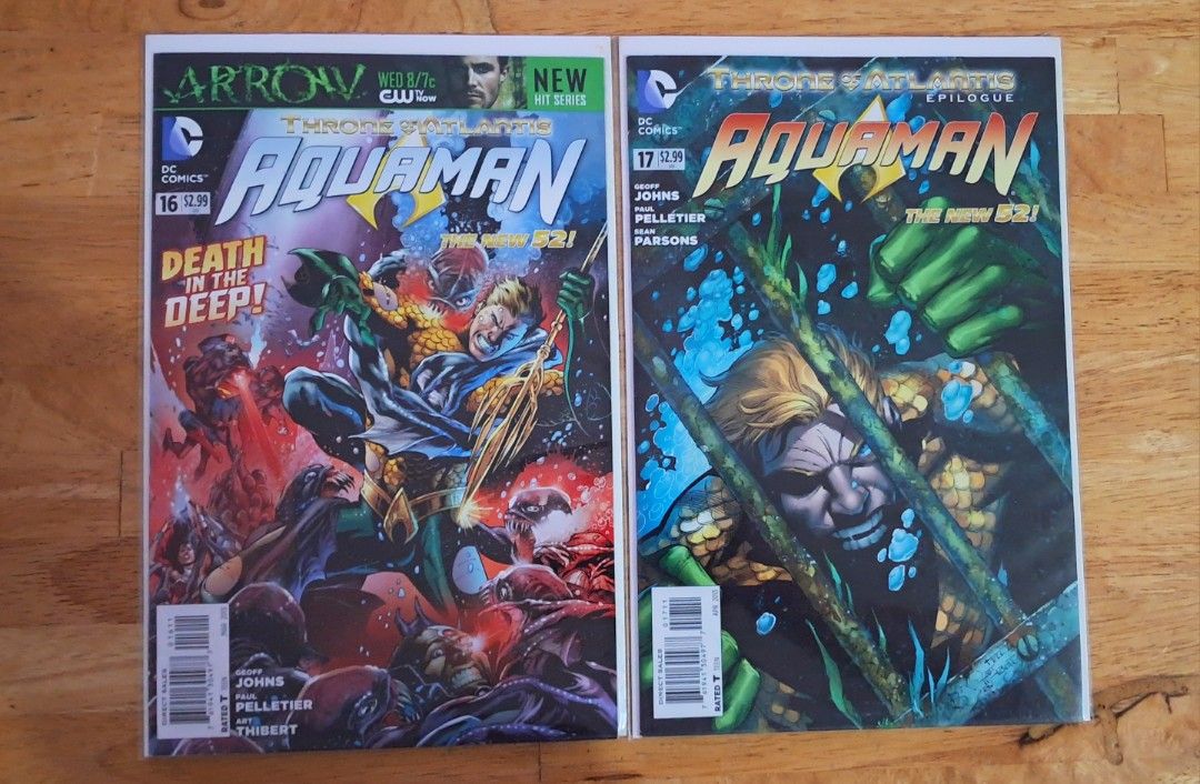 Aquaman Comic Book - The New 52! (Category: Comics & Manga) located in Quezon City. Submitted by ernestamaru2 (Listing ID 1427814189, Image 2). Description: Collection of Aquaman comic books from The New 52! series. Includes issues #14, #15, #16, and #17. Features various covers with Aquaman in action. Published by DC Comics. Each issue has a price tag of $2.99..