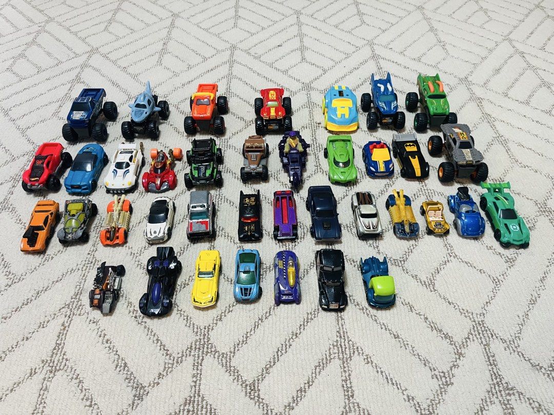 Assorted McDonald's Happy Meal Toys (free shipping) (Category: Character Goods) located in Subic. Submitted by mr_niceguy001 (Listing ID 1427806540, Image 2). Description: (Macdonal Toys ang Hotwheels) (All in 500 pesos) Collection of various McDonald's Happy Meal toys. Includes characters from popular franchises like Pokemon, Minions, Snoopy, and more. Also features a variety of toy cars and other figures. Great for collectors or kids who love t
