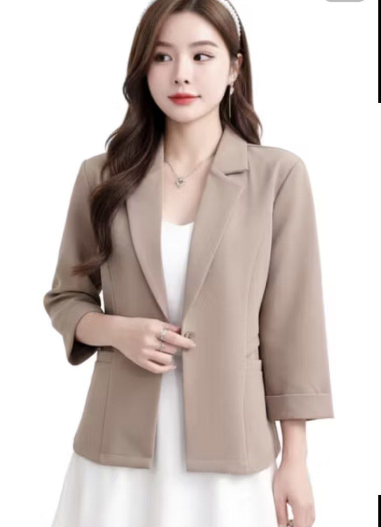 Beige color Blazer Medium Thailand (Category: Coats, Jackets and Outerwear) located in Mandaluyong City. Submitted by stephmd (Listing ID 1424579339, Image 3). Description: - Beige blazer from S.G. Made in Thailand - Size: M - Features a single-button closure. - Has three-quarter sleeves. - Includes two front pockets. - shipping only via J&T.