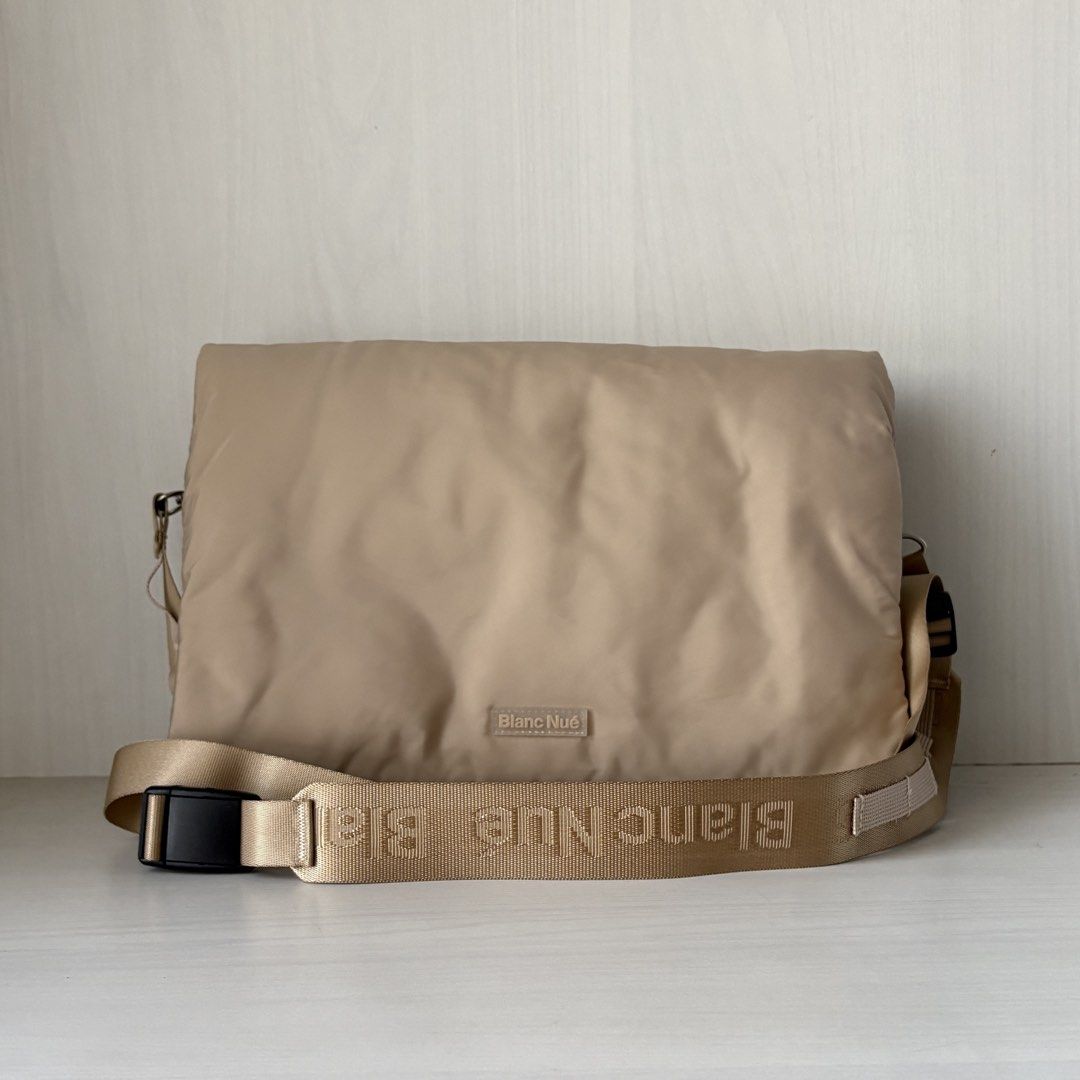 Blanc Nue Pillow Clutch Modular Puffer Bag (Category: Sling Bags) located in Quezon City. Submitted by a.archive.co (Listing ID 1427850876, Image 1). Description: Blanc Nué Pillow Clutch Modular Puffer Bag Colour: Cream Features: - Modular (2-way customizable bag) - Puffer, lightweight Condition: Brand new, never used RFS: Supposedly bought as a gift Mode of Payment: GCash Location: Quezon City.