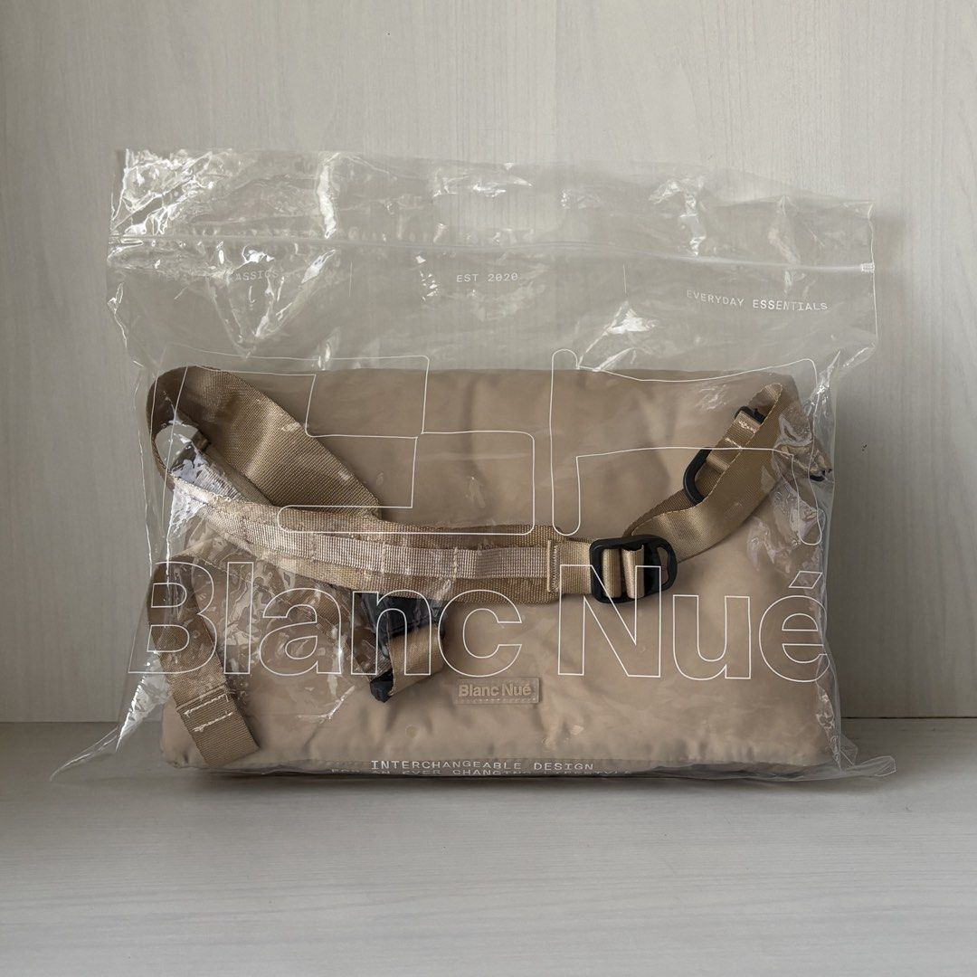 Blanc Nue Pillow Clutch Modular Puffer Bag (Category: Sling Bags) located in Quezon City. Submitted by a.archive.co (Listing ID 1427850876, Image 2). Description: Blanc Nué Pillow Clutch Modular Puffer Bag Colour: Cream Features: - Modular (2-way customizable bag) - Puffer, lightweight Condition: Brand new, never used RFS: Supposedly bought as a gift Mode of Payment: GCash Location: Quezon City.