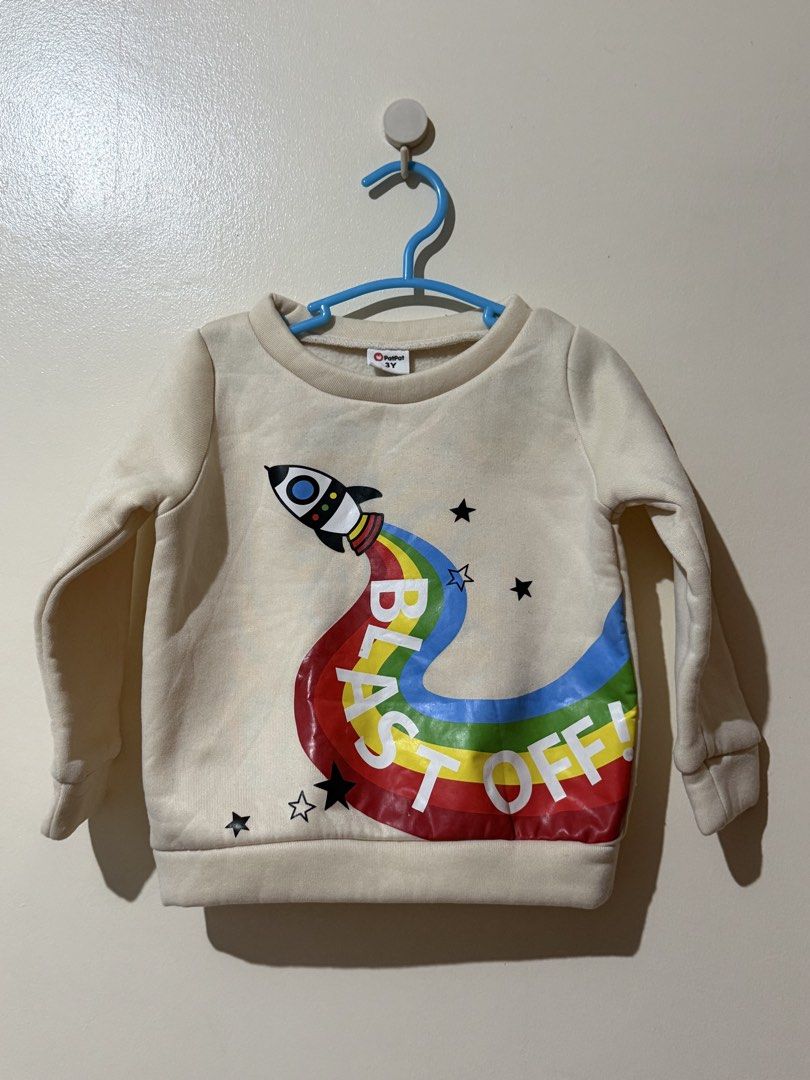 Blast Off Sweatshirt For Kids (Category: Babies & Kids Fashion) located in Pasig City. Submitted by ashoptoremember (Listing ID 1427845229, Image 1). Description: Brand: Patpat Size: 3T RFS: outgrown Used once.