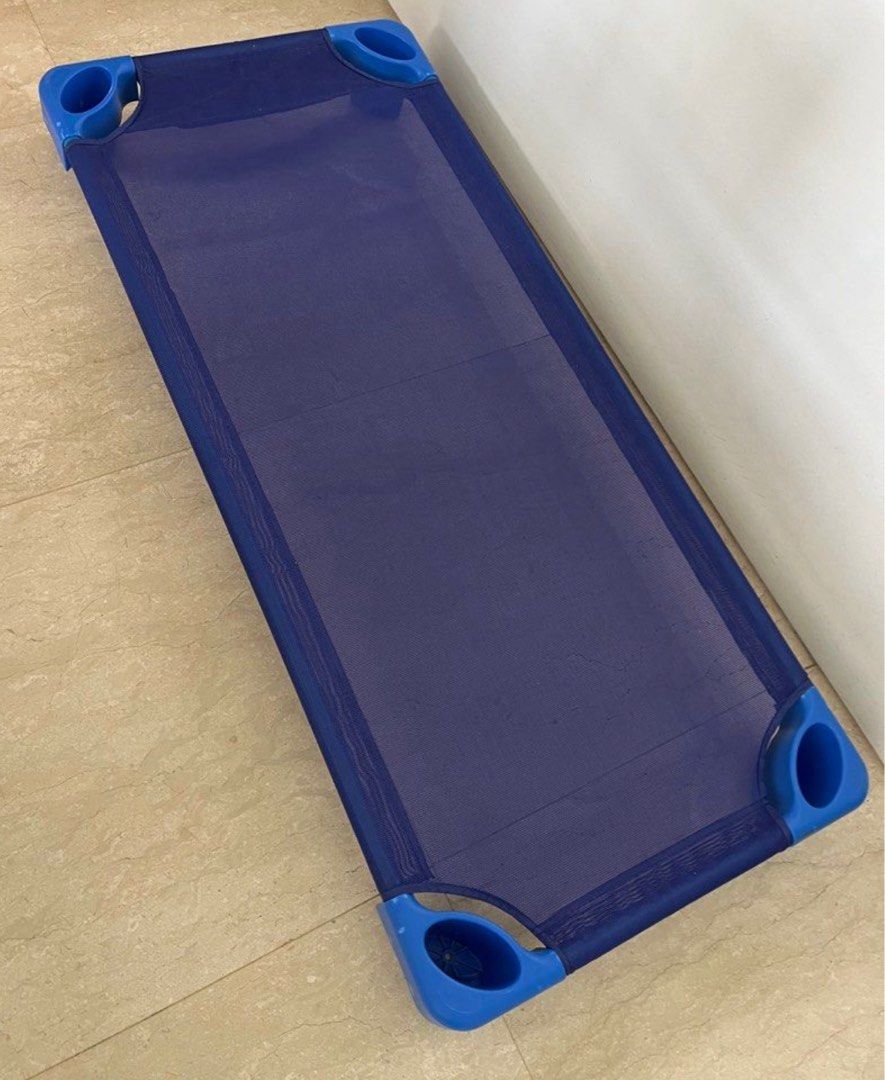 Blue Stackable Cot (Category: Cots & Cribs) located in Singapore. Submitted by shue23 (Listing ID 1427897375, Image 1). Description: Blue mesh surface and blue plastic corners. Perfect for nap time or playtime. Common used in daycare. Easy to clean and store. Almost brand new..