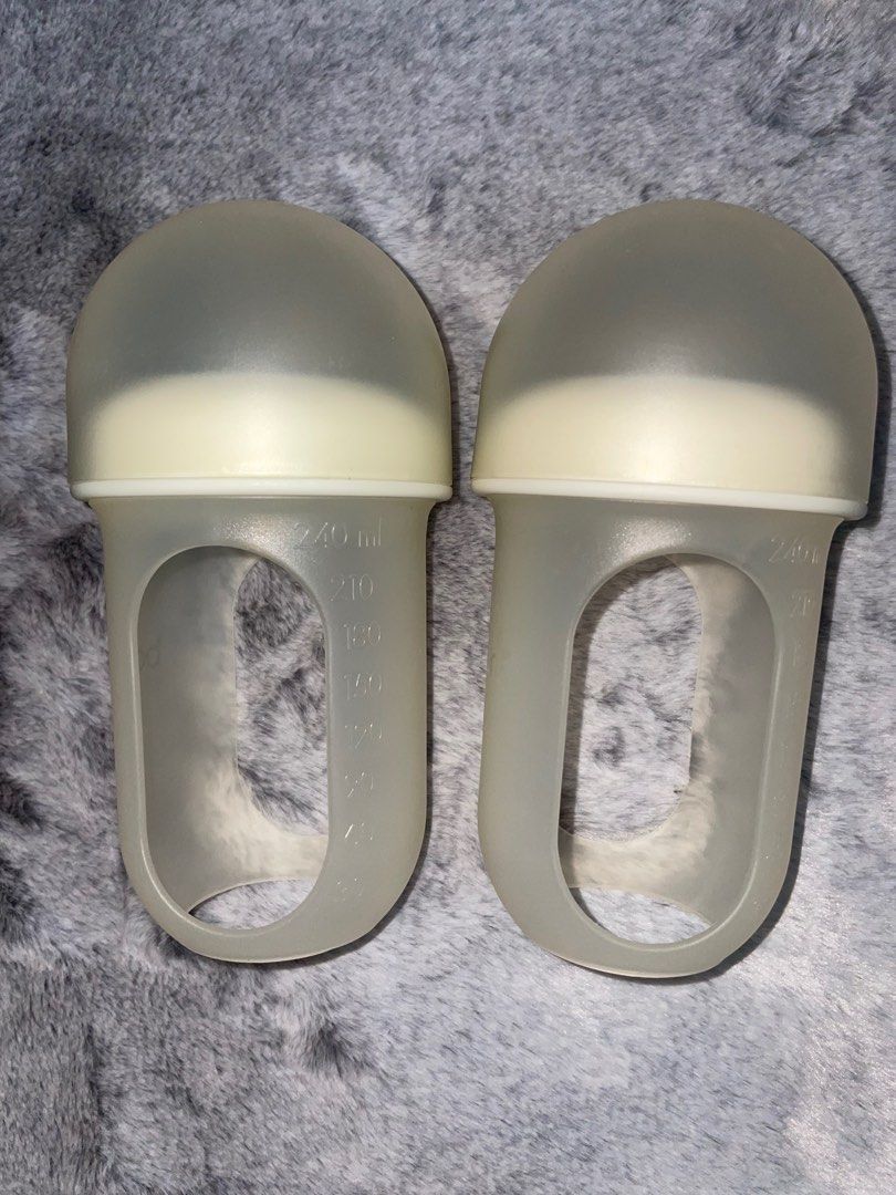 Boon Nursh Baby Bottle (Category: Breastfeeding & Bottle Feeding) located in Manila. Submitted by mkydrandom (Listing ID 1420294665, Image 2). Description: - Unique rounded lid design - Clear window for easy liquid level viewing - Measurement markings on the side - Designed for easy handling and feeding.