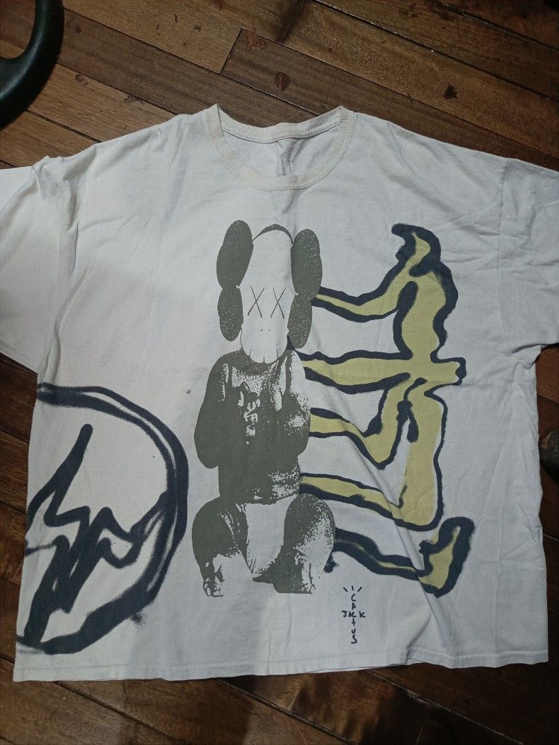 Cactus Jack X Kaws T-shirt (Category: Tshirts & Polo Shirts ) located in Manila. Submitted by lootnlatch (Listing ID 1427868735, Image 1). Description: 28x31 excellent condition no issue sa design need wash lang negotiable.