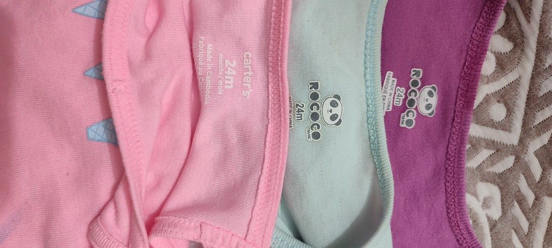 Carter's and Rococo Baby Onesies - 24M bundle (Category: Babies & Kids Fashion) located in Manila. Submitted by dsanjuansdeclutter2 (Listing ID 1427814019, Image 2). Description: Set of three baby onesies. Includes a pink tank top style onesie with a diamond design, a light blue onesie with a balloon design, and a purple onesie with a mouse design. All are size 24 months. Brands include Carter's and Rococo..