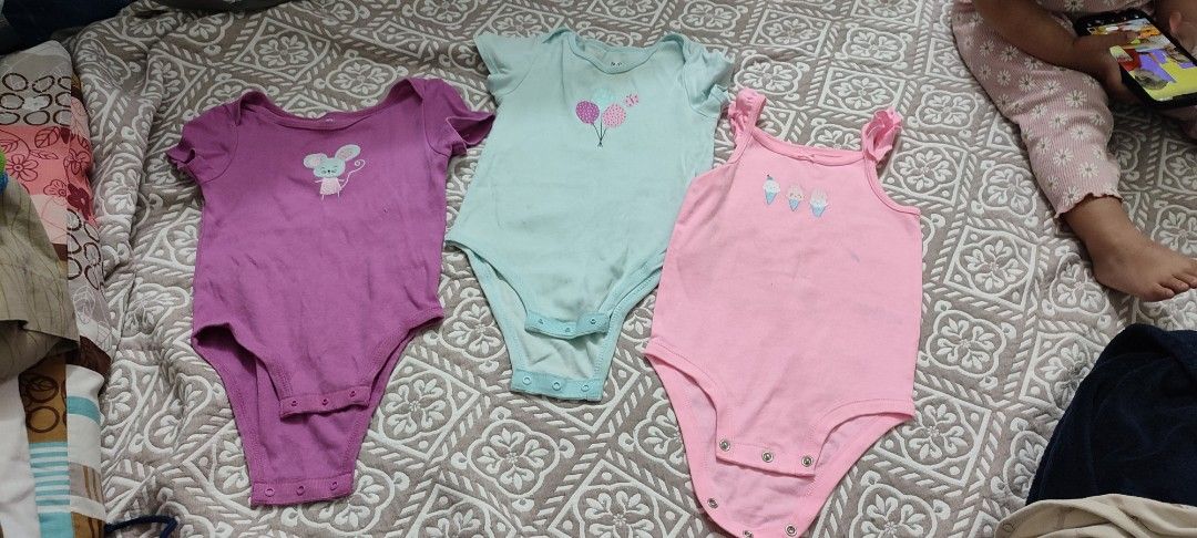Carter's and Rococo Baby Onesies - 24M bundle (Category: Babies & Kids Fashion) located in Manila. Submitted by dsanjuansdeclutter2 (Listing ID 1427814019, Image 1). Description: Set of three baby onesies. Includes a pink tank top style onesie with a diamond design, a light blue onesie with a balloon design, and a purple onesie with a mouse design. All are size 24 months. Brands include Carter's and Rococo..