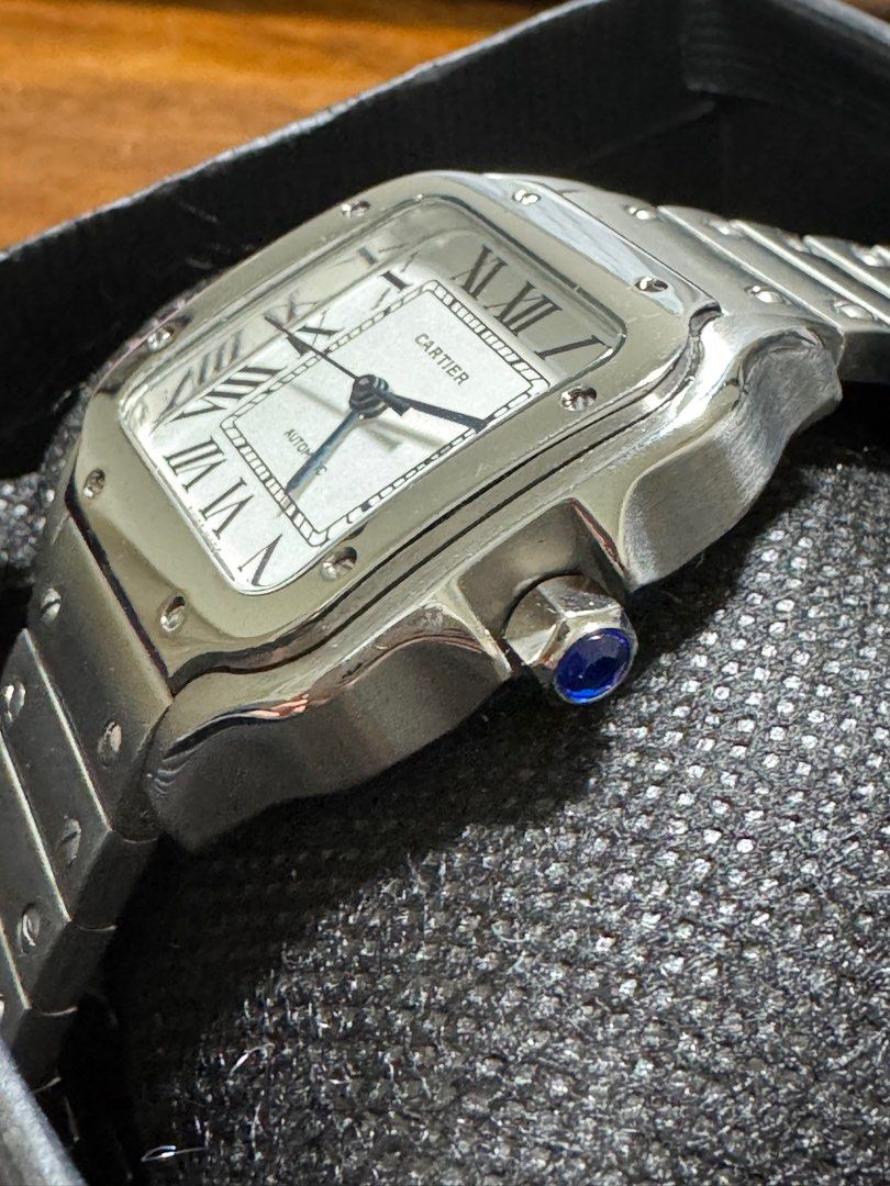 Cartier Santos Medium Automatic (Category: Luxury Watches) located in Quezon City. Submitted by jellyaceeyoo (Listing ID 1427880747, Image 3). Description: • Price listed is slightly negotiable • Item was sourced from surplus • Self-authentication needed • Size: 35mm • Automatic Watch • Inclusions: Box and watch.