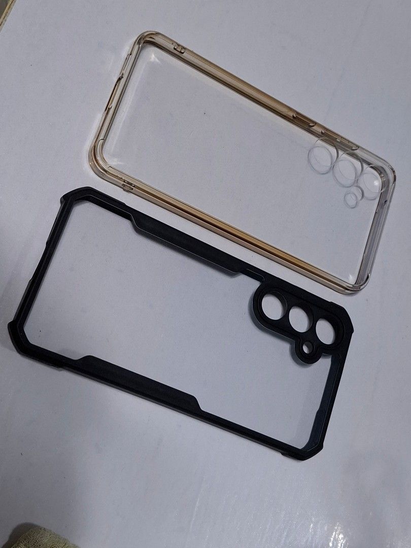 CASES FOR SAMSUNG A55 (Category: Cases & Sleeves) located in Makati City. Submitted by nicejed02 (Listing ID 1427891441, Image 1). Description: FOR SALE 450 PESOS ONLY XUNDD CASE AND RINGKE FUSION CLEAR CASE FOR GALAXY A55 RINGKE CASE SIDES YELLOWISH NA PERO BOTTOM, TOP, FRONT AND BACK CLEAR PA DIN (SEE PICS) PM ME IF INTERESTED ANTIPOLO/CUBAO.