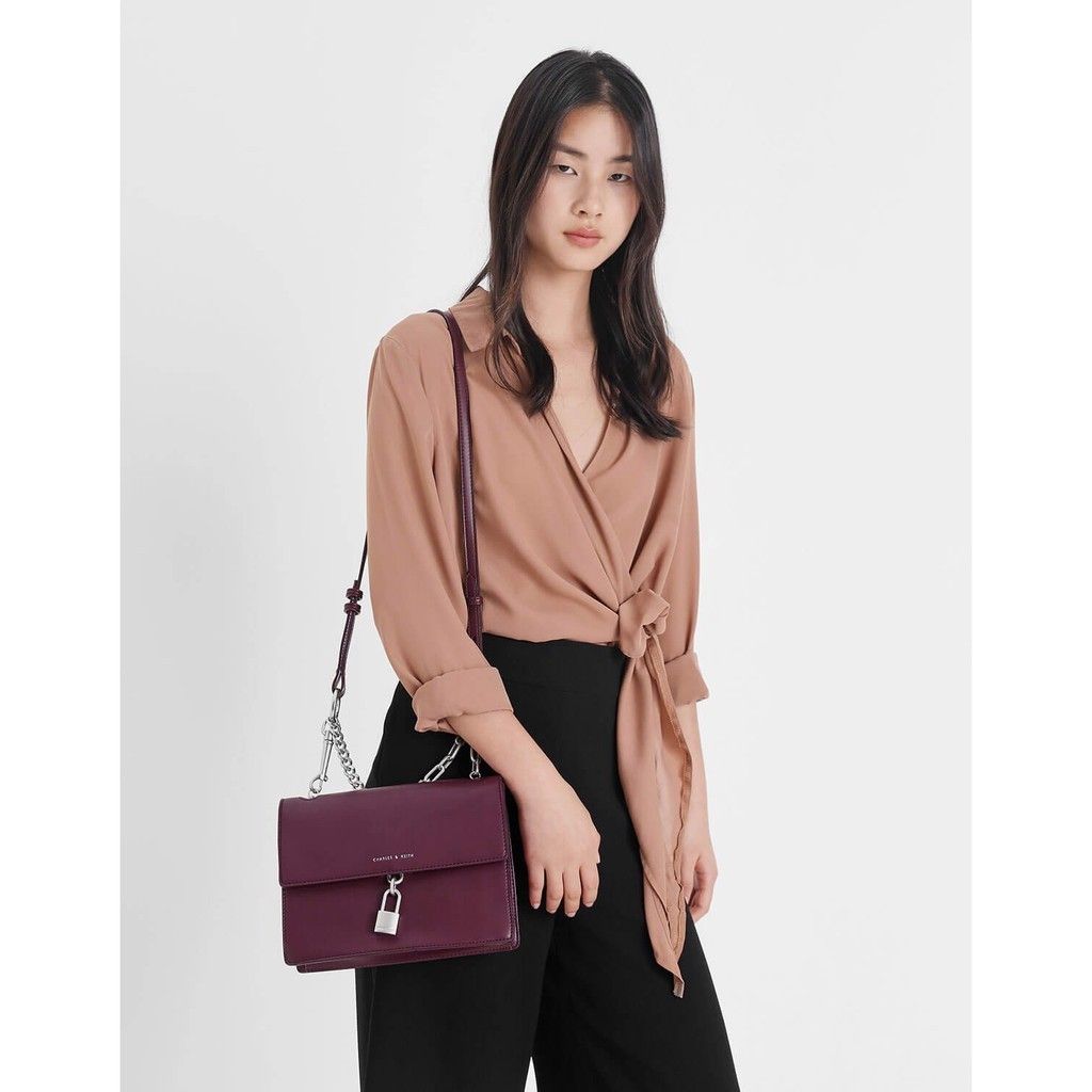 Charles & Keith Padlock Shoulder Bag (Category: Shoulder Bags) located in Dagupan City. Submitted by declutteredbyaj (Listing ID 1427915715, Image 1). Description: 🚛 j&t (free sf) 📍dagupan city, pangasinan 📌 payment first policy 📌MOP: maribank only 📌 strictly no return, no exchange.