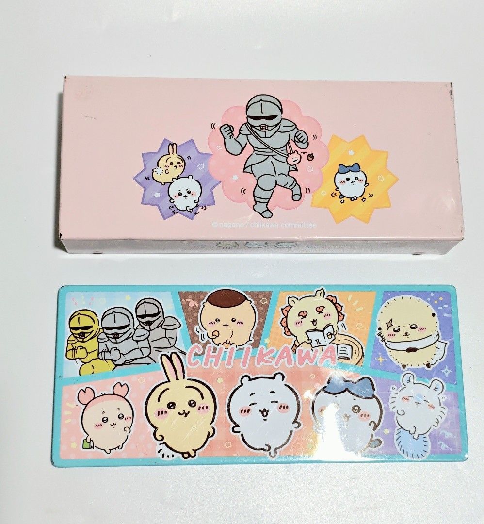 Chikawa Pencil Case (Tin Can) (Category: Stationery & School Supplies) located in Manila. Submitted by yourfavoritethings7 (Listing ID 1427781503, Image 2). Description: Pencil case features a colorful Chikawa design. It has a rectangular shape with a pink lid and a blue base. The case is made of metal. The design includes various Chikawa characters and other illustrations. It is suitable for storing pens, pencils, and other stationery items..