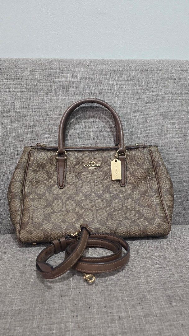 Coach Brown Handbag with Shoulder Strap (Category: Luxury Bags & Wallets) located in Quezon City. Submitted by k8_wallace (Listing ID 1427795240, Image 1). Description: Preloved, rarely used. It's a nice, durable, and fashionable bag. I just find it heavy. Bag material, good as new. Excellent Condition. Authentic Flaws: Tarnish on zipper metal. Hardly noticeable. RFS: Decluttering.