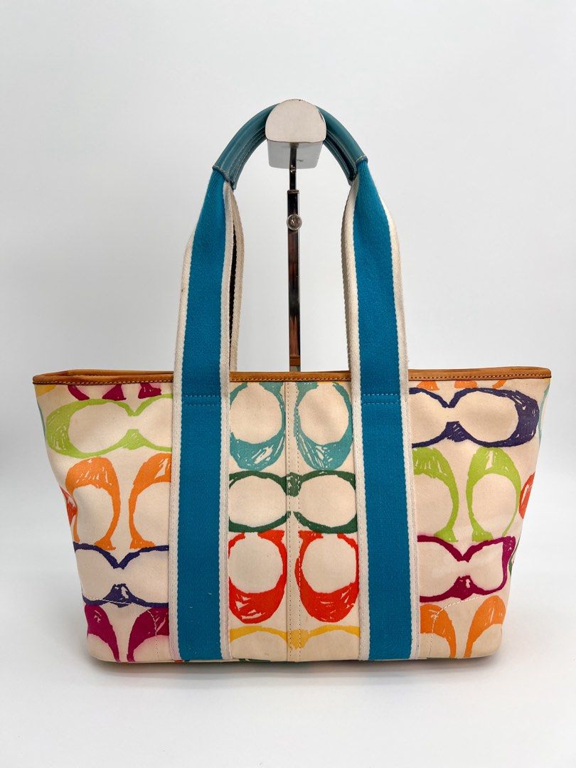 Coach Multicolor Signature Tote Bag (Category: Luxury Bags & Wallets) located in Rizal. Submitted by soldnshipped (Listing ID 1427932346, Image 2). Description: 100% Guaranteed Authentic With minor discoloration in canvas due to cleaning Discoloration in leather trims Shipping fee c/o buyer.