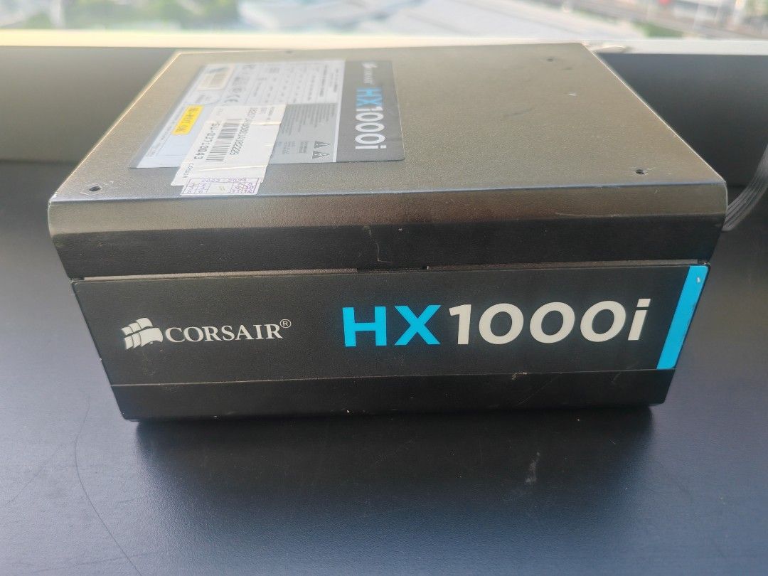 Corsair HX1000i Power Supply (Category: Computer Parts) located in Manila. Submitted by sound.solution (Listing ID 1427852644, Image 2). Description: lightly used Corsair HX1000i power supply. fully modular platinum rated 1000w psu multiple peripheral and SATA connectors, 6+2 PCIe, and 4+4 CPU connectors. Includes a 24-pin ATX connector. The unit has a Corsair Link Digital port and a USB port .