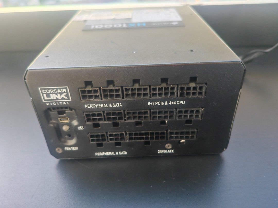 Corsair HX1000i Power Supply (Category: Computer Parts) located in Manila. Submitted by sound.solution (Listing ID 1427852644, Image 3). Description: lightly used Corsair HX1000i power supply. fully modular platinum rated 1000w psu multiple peripheral and SATA connectors, 6+2 PCIe, and 4+4 CPU connectors. Includes a 24-pin ATX connector. The unit has a Corsair Link Digital port and a USB port .
