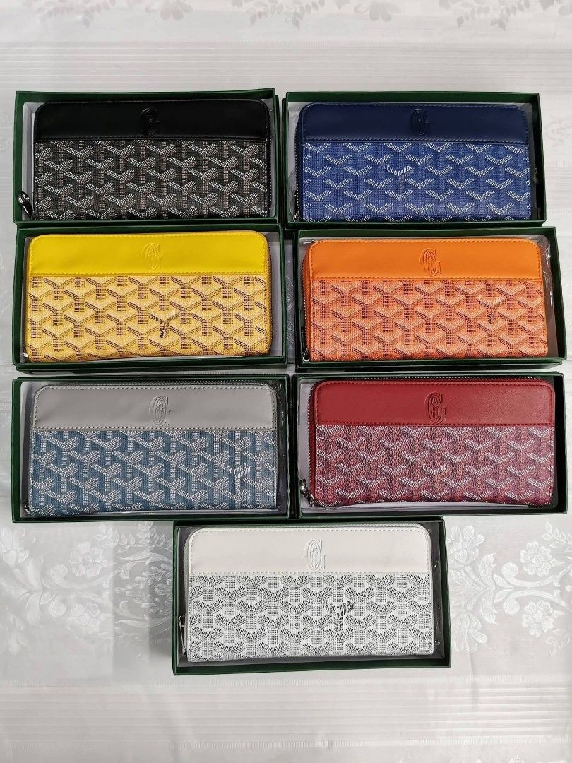 Designer Wallet (Category: Luxury Bags & Wallets) located in Manila. Submitted by shopdirectmla (Listing ID 1427933274, Image 1). Description: Stylish wallet featuring a unique pattern. Available in various colors, including black, blue, yellow, orange, gray, red, and white. Comes with a box. Perfect for keeping your essentials organized in style..