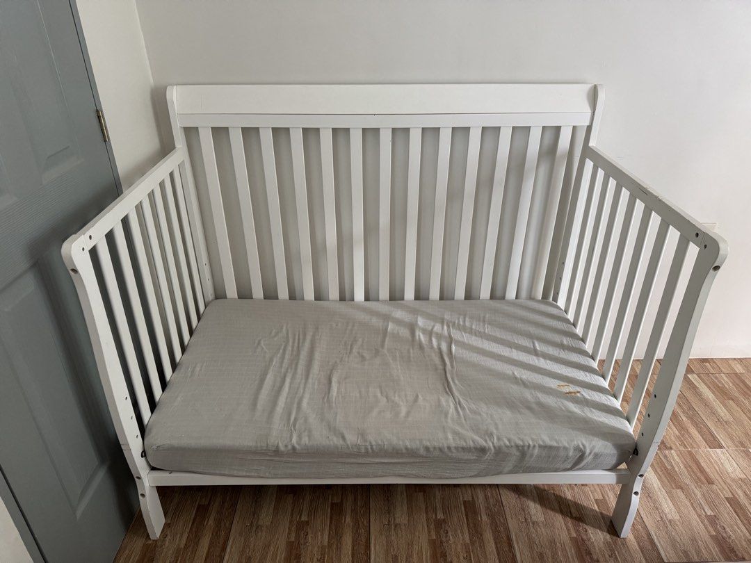 Dwelling White Baby Crib (Category: Cots & Cribs) located in Rizal. Submitted by christellebasilio (Listing ID 1427809740, Image 2). Description: Includes uratex foam.