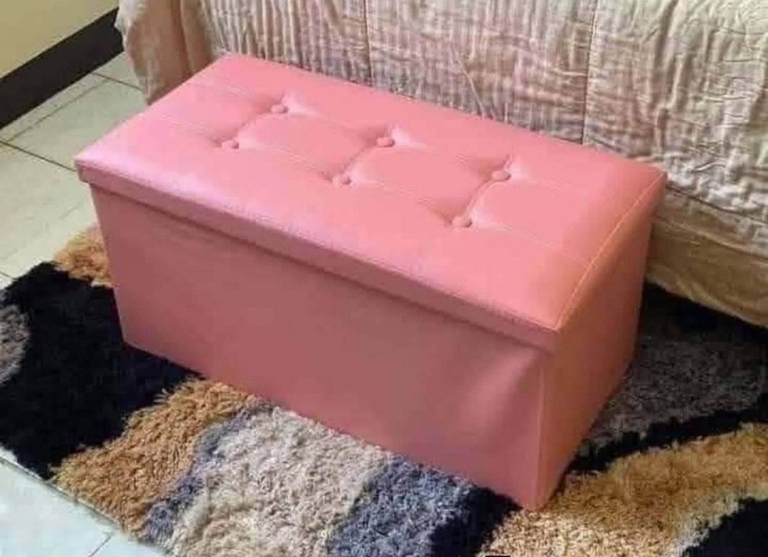 Foldable Storage Sofa box (Category: Chairs) located in Manila. Submitted by jelai.cybyb (Listing ID 1427804681, Image 3). Description: Foldable storage ottoman bench is a versatile piece for any room. It features a tufted top and comes in various colors, including brown, black, pink, red, and blue. The ottoman provides hidden storage space and can be used as a footrest or extra seating. It's a practical and stylish solution for organizing your s