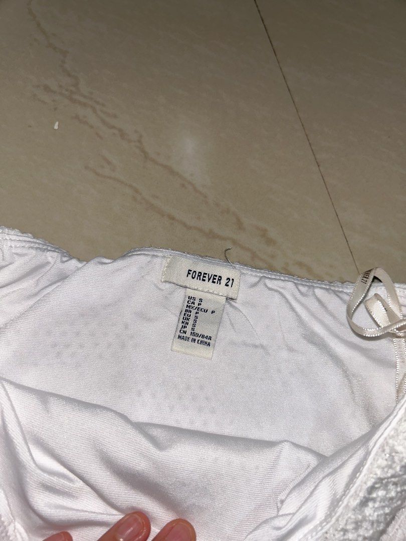Forever 21 White Lace Tube Top (Category: Sleeveless) located in Tuguegarao City. Submitted by imaclr (Listing ID 1427807982, Image 2). Description: hi! visit my profile for more pre-loved clothes. price is negotiable esp if you buy more items :) thank you! :).