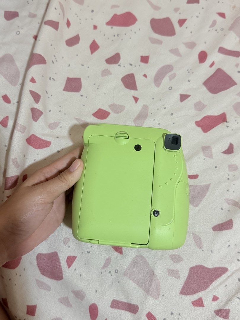 Fujifilm Instax Mini 9 (Category: Cameras) located in Lipa City. Submitted by lrashane_ (Listing ID 1427794482, Image 2). Description: - Issue: Selfie Mirror Part is gone BUT the camera is working perfectly well - With free case and lace - no films included.