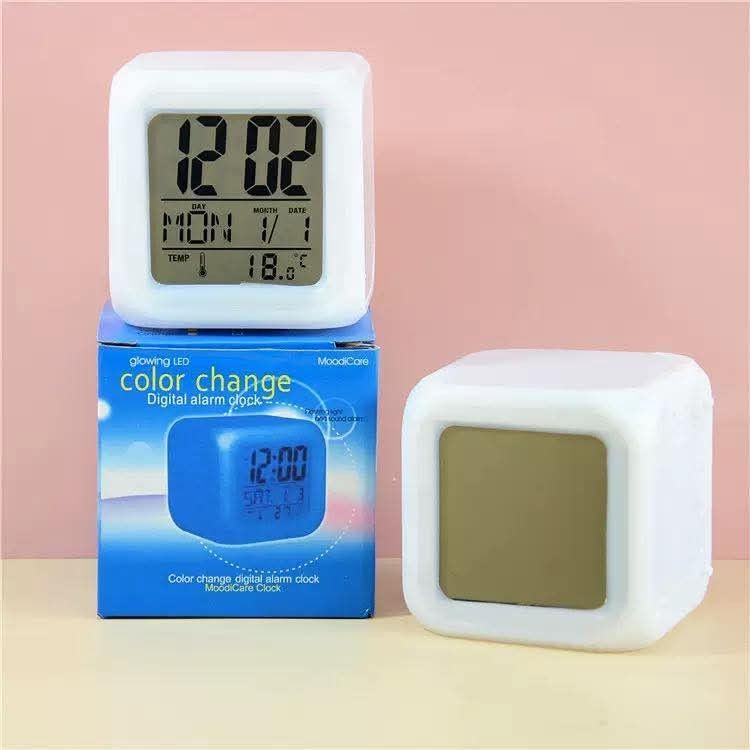 Glowing LED Color Change Digital Alarm Clock (Category: Clocks) located in Manila. Submitted by yzlshop (Listing ID 1427799279, Image 1). Description: Digital alarm clock features a color-changing LED display. It shows the time, date, day, and temperature. The clock has a cube design and comes with its original box..