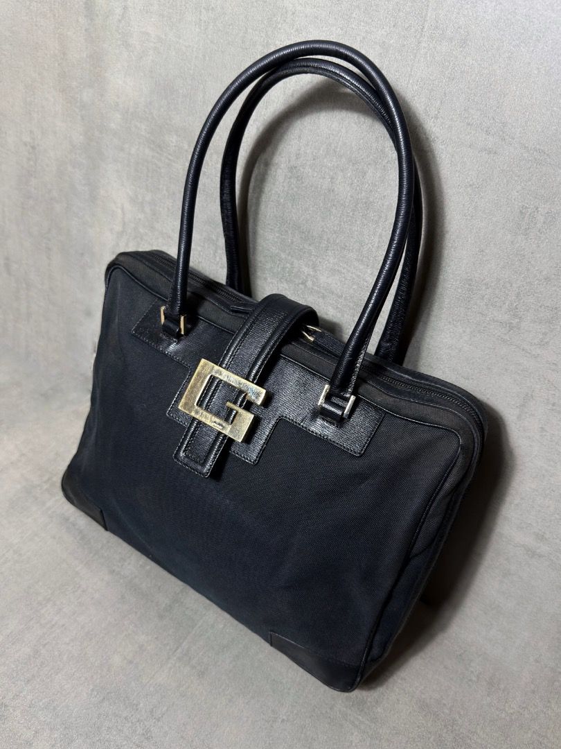 Gucci - Tom Ford - 2000s Canvas Shoulder Bag (Category: Luxury Bags & Wallets) located in Subic. Submitted by concretefloor (Listing ID 1427878492, Image 2). Description: Gucci - Tom Ford - 2000s Canvas Shoulder Bag From late 90s to early 2000s Good condition Minor rubs Signs of use Rank AB Negotiable!.