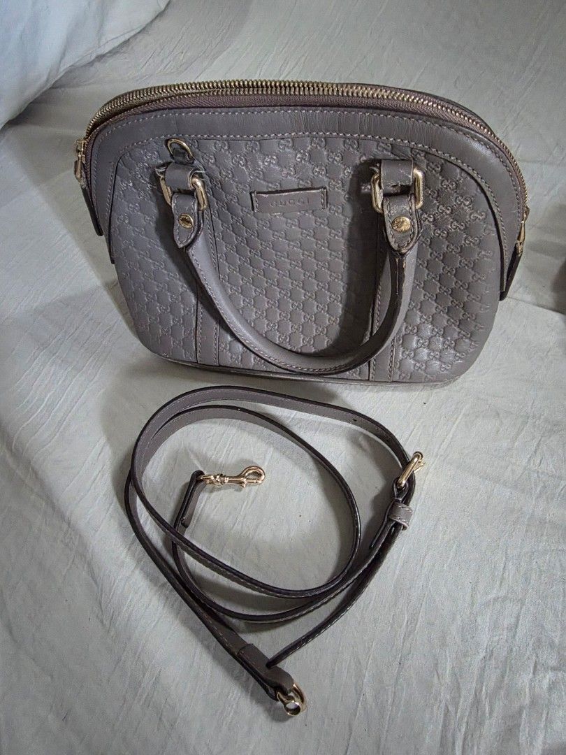 Gucci Microguccissima Dome Bag (Category: Luxury Bags & Wallets) located in Quezon City. Submitted by jek017 (Listing ID 1427816753, Image 2). Description: Gucci handbag features the iconic Microguccissima pattern. It has a top handle and comes with a detachable shoulder strap for versatile carrying options. The bag has a zip closure and gold-tone hardware. It is a dome-shaped bag..