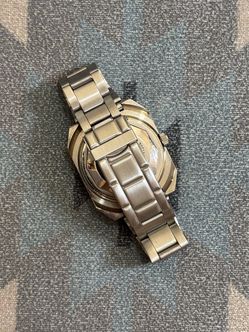 Hashu Electronvolt Digital Model Jump Hour Vintage Design Watch (Category: Men's Watches) located in Cebu City. Submitted by anythingwithvalue (Listing ID 1427848158, Image 2). Description: Hashu Electronvolt digital model. quartz movement. battery operated. New York design. since 1970 branding. jump hour style display. unique rotating disc. conversation piece. yellow dial. very eye catching. retro futuristic look. 1970s inspired design. strong v