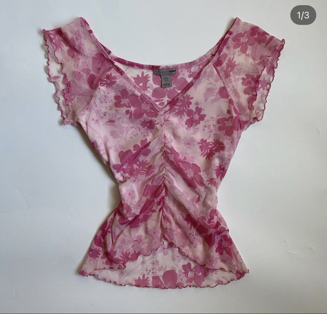 H&M Floral Ruched Top (Category: Blouses) located in Quezon City. Submitted by unaespiritu (Listing ID 1427910664, Image 1). Description: •sheer yung arms na part • perf pang cover ng bikini.