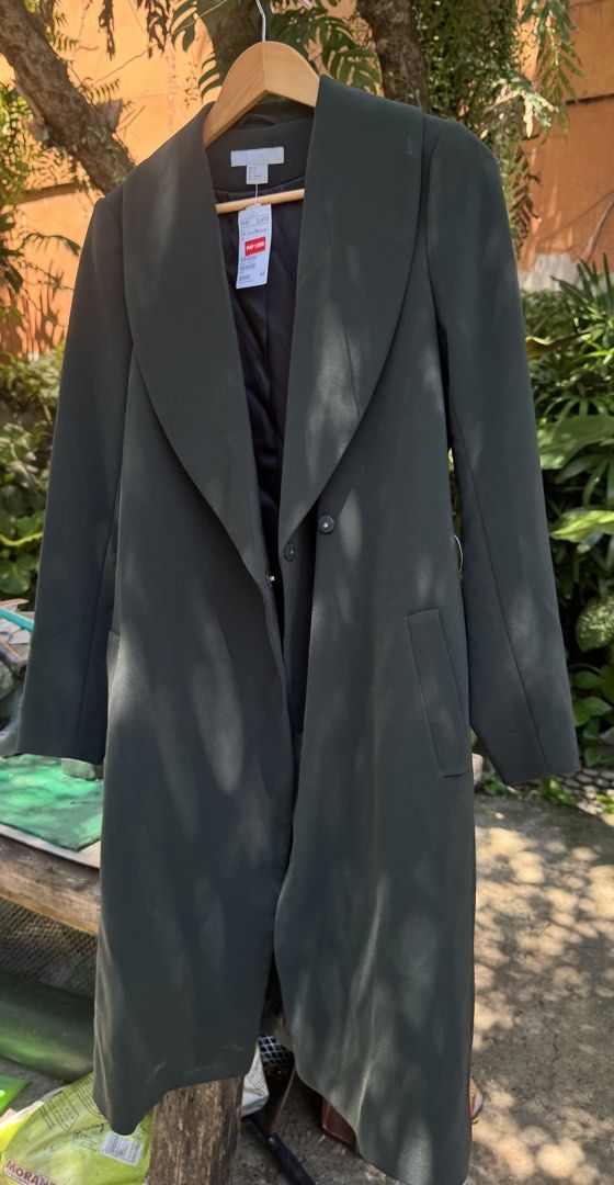 H&M Long Coat - Dark Green (Category: Coats, Jackets and Outerwear) located in Makati City. Submitted by badgalroqroq (Listing ID 1427818120, Image 1). Description: Brand new No flaws.