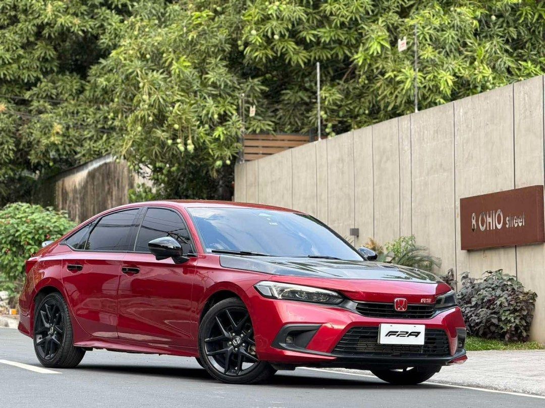 Honda Civic RS Turbo Auto (Category: Used Cars) located in Manila. Submitted by quality_cars (Listing ID 1427926478, Image 2). Description: ❗️FRESH CATCH - New arrival ❗️ ❗️For sale CASH / FINANCING ❗️ 2023 Honda Civic RS Turbo All stock except Carbon Fiber Varis Hood. 20K+ mileage Automatic Transmission AT Power Tailgate Keyless Ignition/Start Engine 1.5-liter four-pot VTEC Turbo Special Color: 🔴 Ignite Red Exclusive for RS Variant ✅Asking Pric