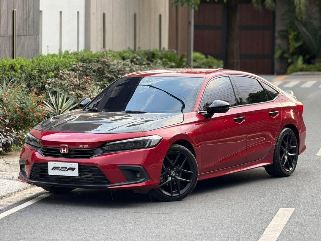Honda Civic RS Turbo Auto (Category: Used Cars) located in Manila. Submitted by quality_cars (Listing ID 1427926478, Image 3). Description: ❗️FRESH CATCH - New arrival ❗️ ❗️For sale CASH / FINANCING ❗️ 2023 Honda Civic RS Turbo All stock except Carbon Fiber Varis Hood. 20K+ mileage Automatic Transmission AT Power Tailgate Keyless Ignition/Start Engine 1.5-liter four-pot VTEC Turbo Special Color: 🔴 Ignite Red Exclusive for RS Variant ✅Asking Pric