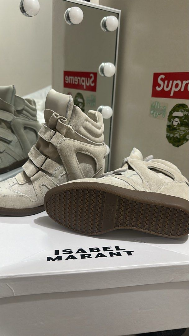 Isabel Marant Wedge Bekett Sneakers (Category: Sneakers) located in Manila. Submitted by luvsosa (Listing ID 1425748950, Image 3). Description: - All Sizes Available -Other Colorways Available -With Box and Tote Bag - DM IF U WANT PROOF OF PURCHASE OR OTHER INQUIRIES -MOP: Gcash -MOD: J&T or Lalamove.
