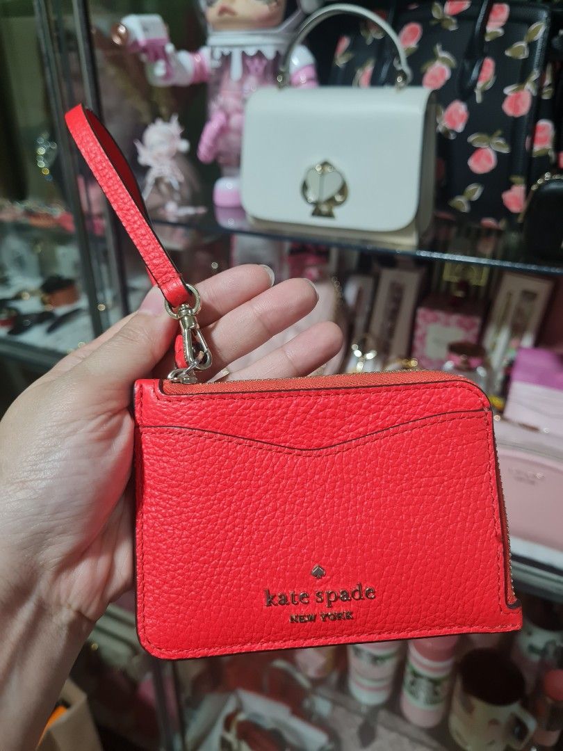 Kate Spade Leila small cardholder wristlet (Category: Luxury Bags & Wallets) located in Quezon City. Submitted by luli_18 (Listing ID 1427863407, Image 1). Description: .