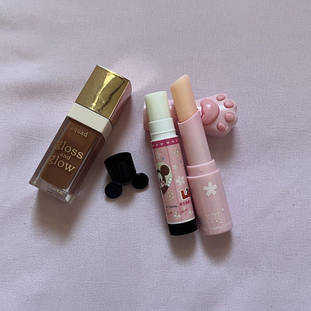 lip product bundle (Category: Makeup) located in Quezon City. Submitted by wear.elocin (Listing ID 1427851651, Image 2). Description: - squad cosmetics gloss & glow (cool) - mickey mouse lip ice - cat pink lip balm .