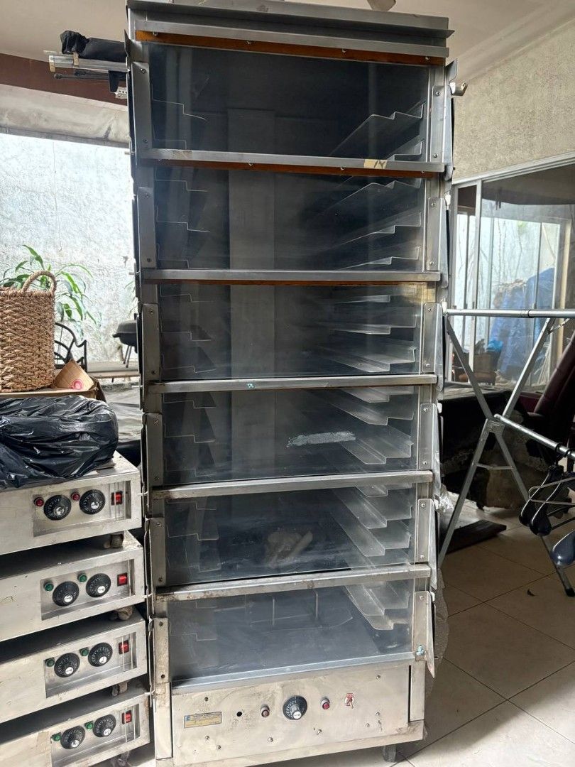 Lowtemp Cmmercial Proofer (Category: Ovens & Toasters) located in Makati City. Submitted by bernardcgo (Listing ID 1427802678, Image 1). Description: Commercial oven with multiple racks. Includes several individual heating units with control knobs. The oven has a Lowtemp Corporation sticker. .