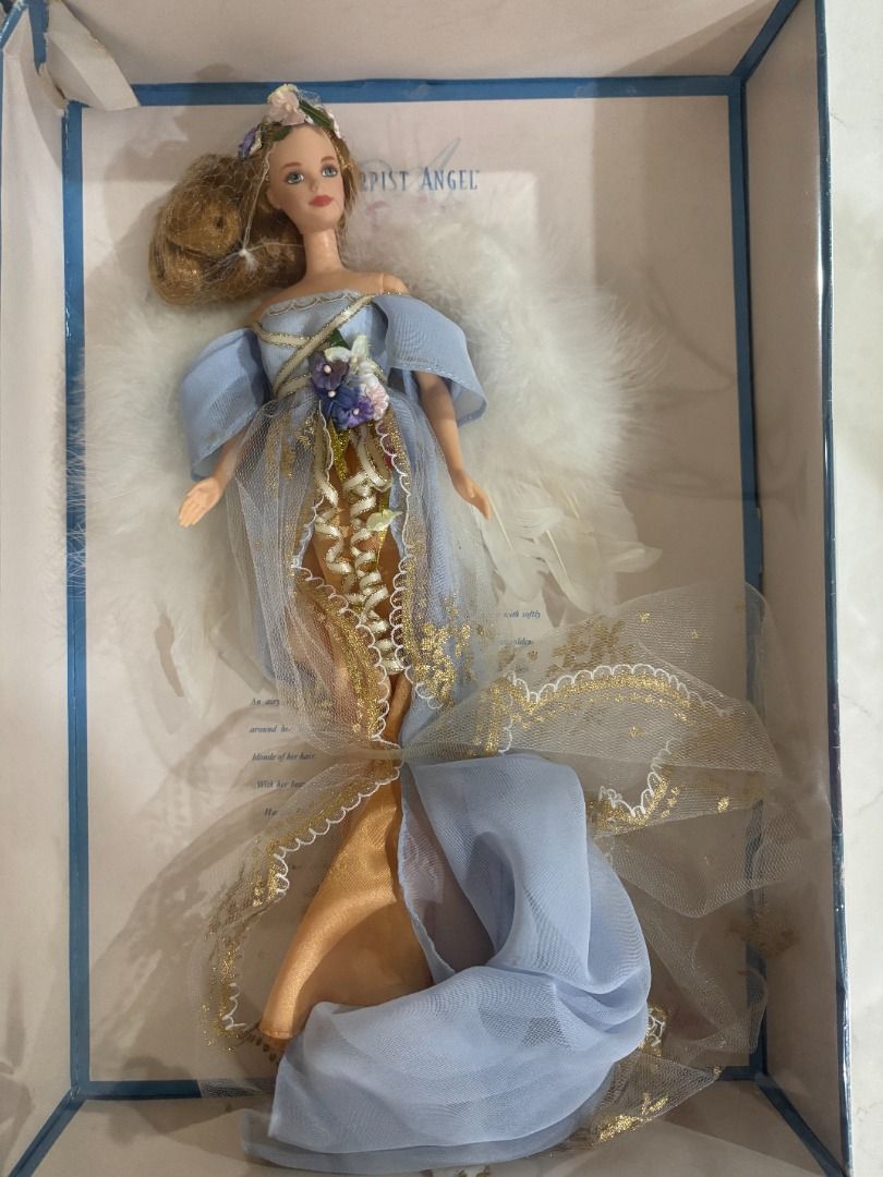 Mattel Barbie Angels Collectors' (Category: Figurines & Statues) located in Makati City. Submitted by gabdee (Listing ID 1427824656, Image 2). Description: Mattel Barbie - Holiday Angel Doll - Collector Edition 2000 Mattel Red Mint in box = 6000 Blue Mint in box = 6000 Golden Angel Barbie (Pink label) Mint in Box = 6000 1998 - Mattel - Barbie Collectibles - Angel of Joy Barbie - 1st in Series - Timeless Sentiments Collection - Collector Edition =