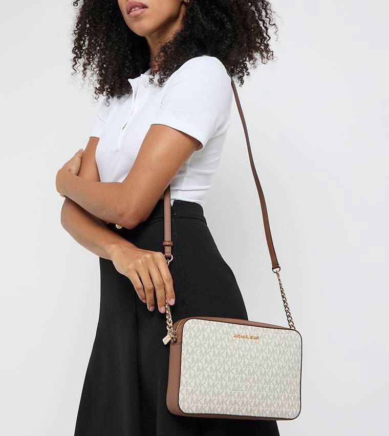 Michael Kors Jet Set Large Crossbody Bag (Category: Cross-body Bags) located in Baguio. Submitted by donafaye (Listing ID 1427793234, Image 2). Description: Michael Kors Jet Set Large Cross-body bag Brand new and Original Inclusion: care card only.