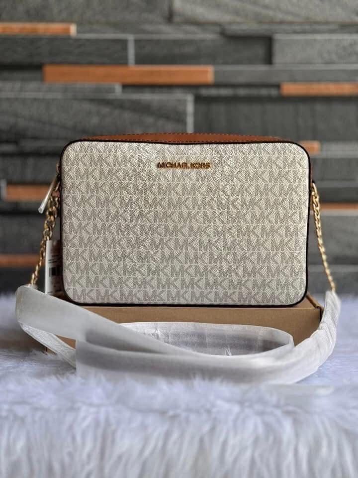 Michael Kors Jet Set Large Crossbody Bag (Category: Cross-body Bags) located in Baguio. Submitted by donafaye (Listing ID 1427793234, Image 1). Description: Michael Kors Jet Set Large Cross-body bag Brand new and Original Inclusion: care card only.