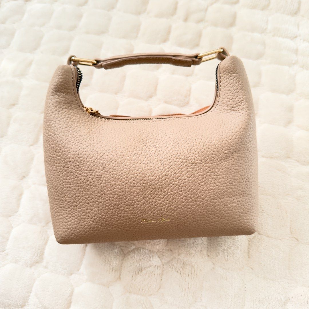 Milan Chiva Beige Two-way Small Bag (Category: Shoulder Bags) located in Antipolo. Submitted by rosywardrobe (Listing ID 1427827840, Image 2). Description: 🎀 MAKE READING A HABIT 🎀 • No order form, no reservation! • Strictly 1 day reservation • Payment first before order processing • No return, No exchange • Don’t make an offer if you’re not 100% sure • No shipping every weekends — PAYMENT CHANNELS — • GCash • Gotyme • Maya • BDO • BPI • Unionb