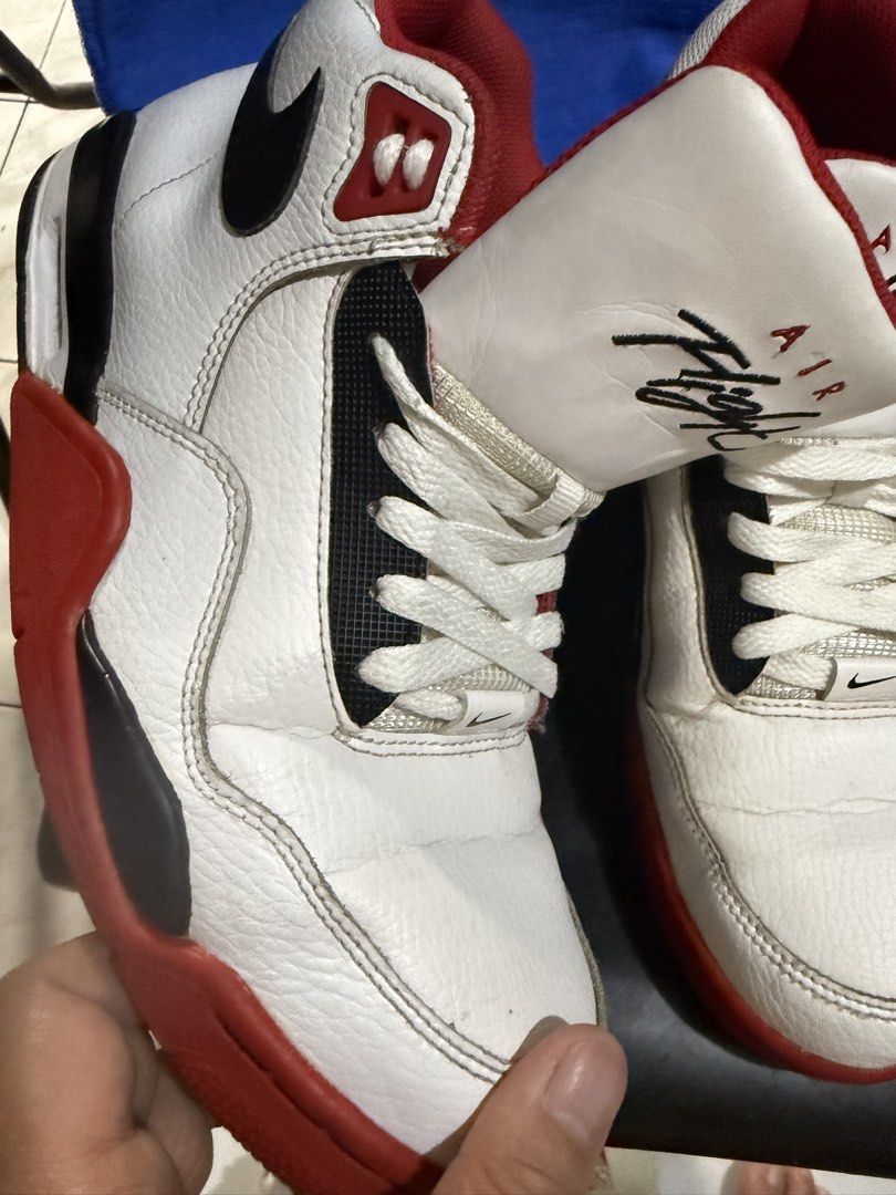 Nike Air Flight Sneakers - US 8 (Category: Sneakers) located in Quezon City. Submitted by piatot (Listing ID 1427784966, Image 3). Description: Nike Air Flight sneakers in white and red. Features the Air Flight logo on the tongue. The size is US 8, UK 7, EUR 41, and CM 26.0. Made in Indonesia. The soles are red and black with the Nike logo. The shoes have white laces and a red interior. .