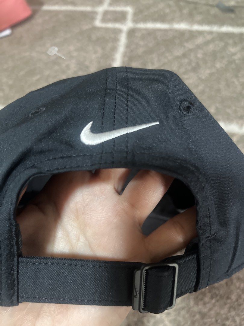 Nike Club Cap M/L (Category: Caps & Hats) located in Pasig City. Submitted by jundbaptist21 (Listing ID 1427823473, Image 2). Description: Nike Club Cap in size M/L. It is black and has the Nike logo on the front and back. The cap has an adjustable strap at the back. The original tag is still attached, showing a suggested retail price of $24. Original from u.s.