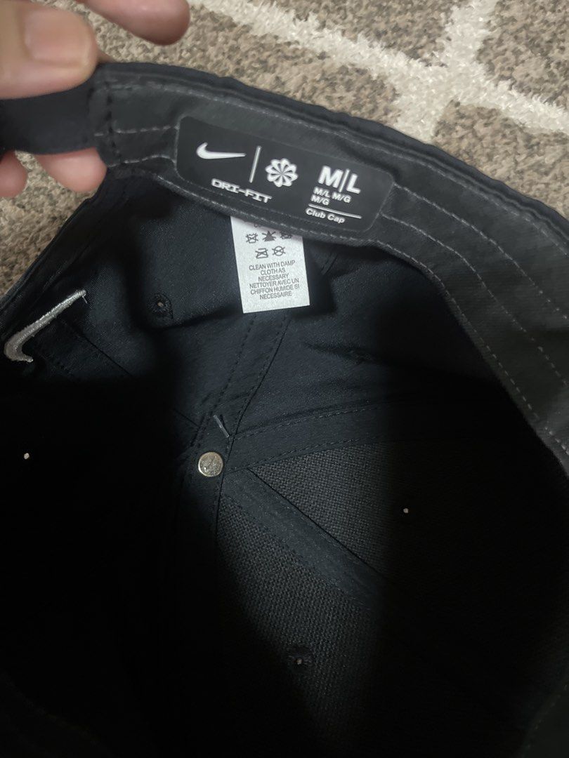 Nike Club Cap M/L (Category: Caps & Hats) located in Pasig City. Submitted by jundbaptist21 (Listing ID 1427823473, Image 3). Description: Nike Club Cap in size M/L. It is black and has the Nike logo on the front and back. The cap has an adjustable strap at the back. The original tag is still attached, showing a suggested retail price of $24. Original from u.s.
