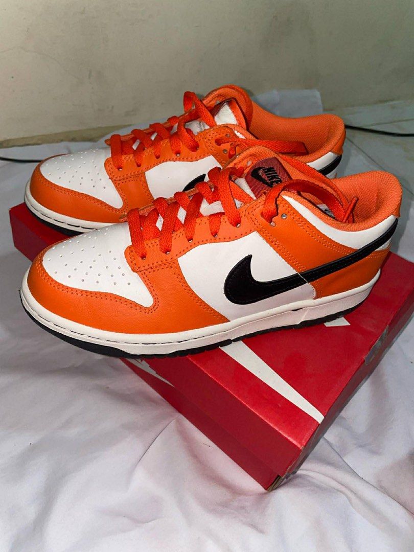 Nike Dunk Low - Phantom Orange (Category: Sneakers) located in Bacoor. Submitted by patrickluwis (Listing ID 1427918364, Image 1). Description: Womens Nike Dunk Low in Phantom Orange US8 Good as new. Bought from Taiwan. Used twice only No signs of usage 9/10.