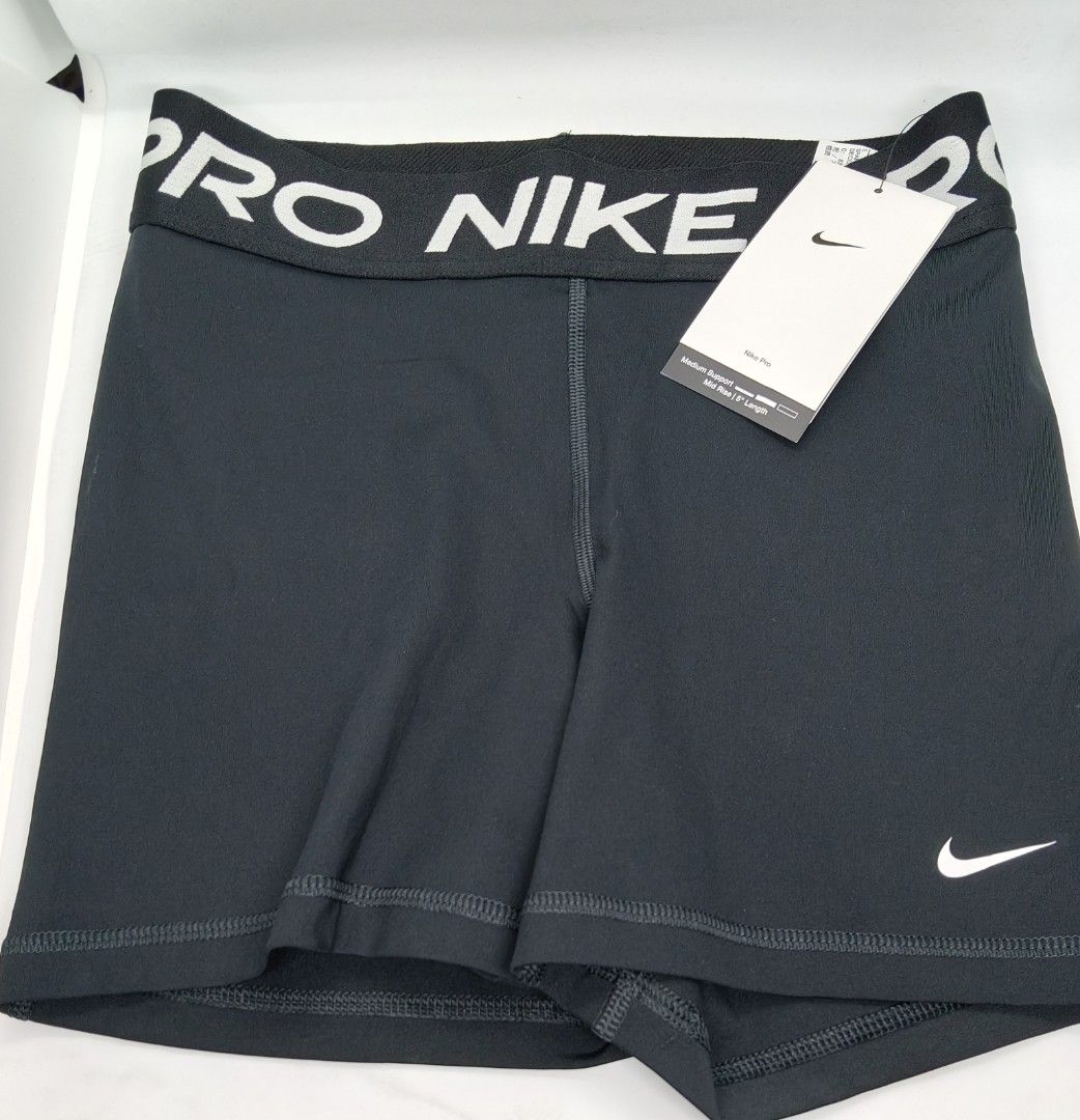 Nike Pro Shorts MIDRISE 5"LENGTH (Category: Activewear) located in Baguio. Submitted by all_uneed2600 (Listing ID 1427814574, Image 2). Description: 3 PC's MEDIUM Black Nike Pro shorts. Features a white Nike logo on the leg and a white "PRO NIKE" waistband. The shorts appear to be made of a stretchy material. The tag is still attached..