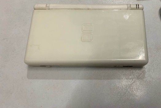 Nintendo DS Lite White (Category: Nintendo) located in Bacoor. Submitted by qualityucantrust (Listing ID 1427781060, Image 2). Description: NINTENDO DS LITE WHITE ALL GOODS AS PHOTOS POSTED NEED LANG CLEANING MEDYO LUMA NA SYA PERO WORKING PA..👍 INCLUSION: UNIT AND REPLACEMENT CHARGER FREEBIES: 2PCS DS GAME CARTRIDGES AND SAMSUNG EARPHONE👍 SUREBUYER SHOULDER SHIPPING...🙏🏼 QUALITY U CAN TRUST™.