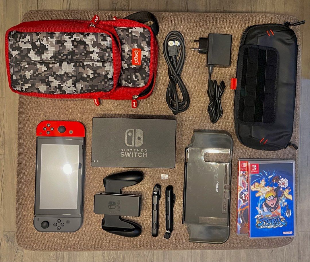 Nintendo Switch 1 V2 Gray & Red [Bundle] (Category: Nintendo) located in Manila. Submitted by joshdecluttering (Listing ID 1427916974, Image 1). Description: In pristine and excellent working condition. Grip case and screen protector from purchase. No box. Comes with: - Unit - Original Dock - Red and Gray Controller - Joycon Grip - Joycon Strap - Original Charger - Original HDMI cable - Sandisk 128gb MicroSD - Ugreen Grip Case Protector [value P7